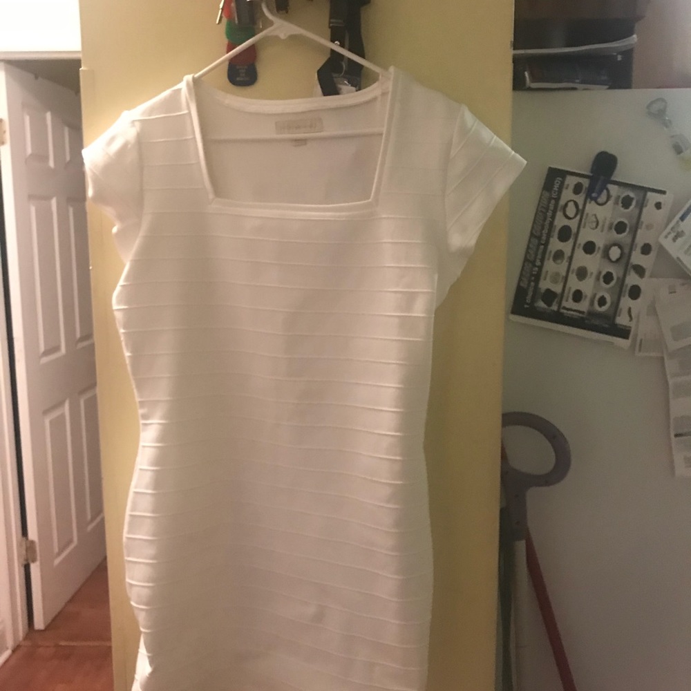 White knee length dress. Make me an offer